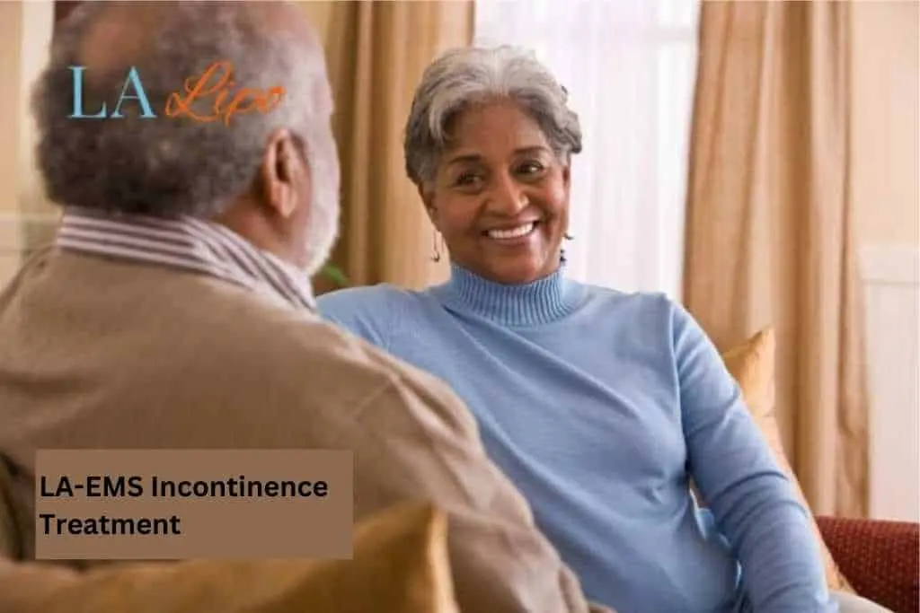 Couple sat smiling at each other - LA-EMS treatment Beaconsfield