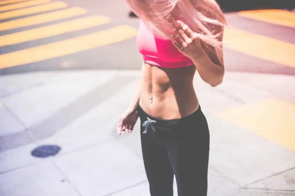 Woman with toned stomach after LA-EMS Body Sculpting Treatment Beaconsfield